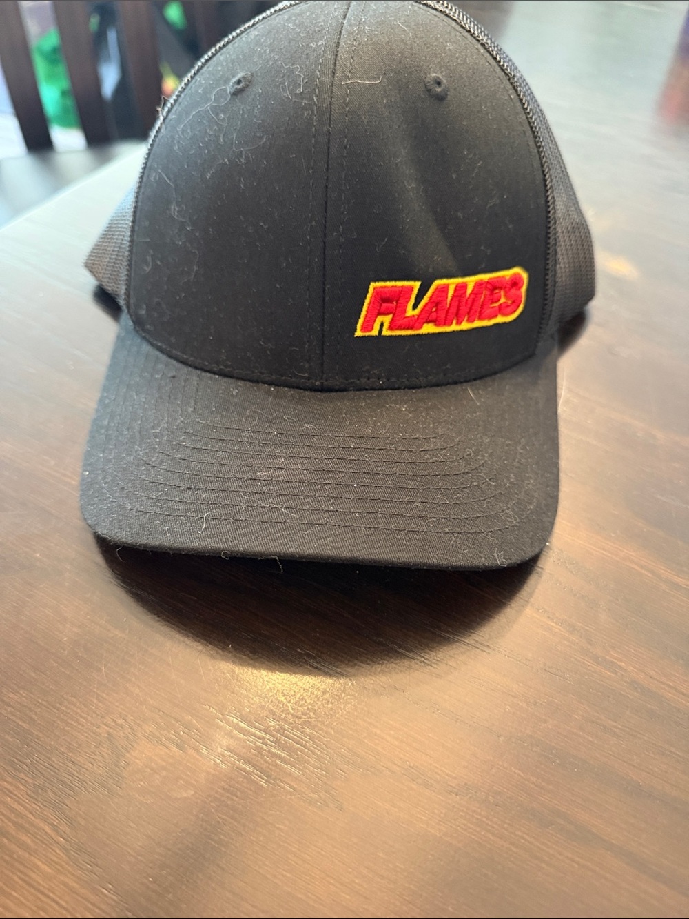 The Classics Black Trucker Hat with ‘FLAMES’ Patch